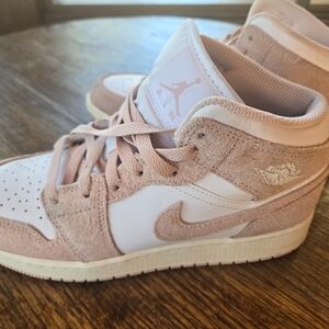Nike Air Jordan 1 Mid SE in the "Legend Pink" colorway. Size 6Y.